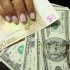 Euro nuovo minimo storico sotto 1,21 dollari