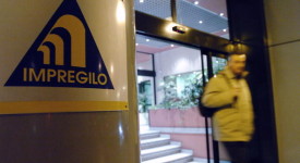 A man walks past the entrance of Impregi